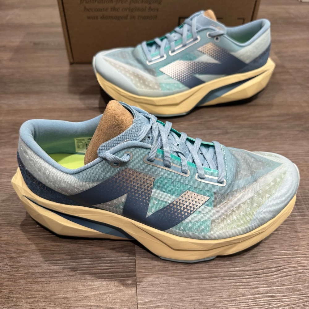New Balance Fuel Cell Rebel V4 Quarry Blue Chrome Heron Blue Athletic Sneakers